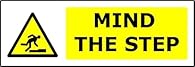Clear “Mind The Step” sign with a high-visibility yellow background, printed on durable Self-Adhesive Vinyl for long-lasting indoor or outdoor use. Ideal for warehouses, factories, construction sites, stairwells, corridors and walkways to highlight h...