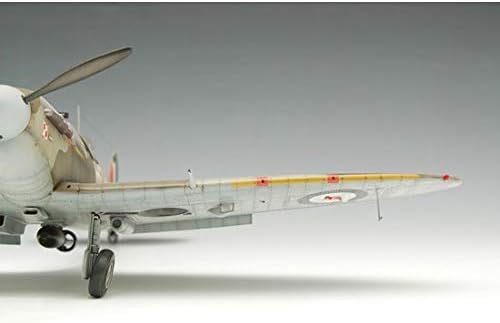Close-up of the wing and landing gear of an assembled Supermarine Spitfire model.