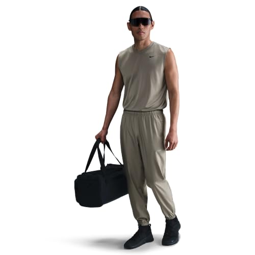 Image of Nike Men's Form Dri-FIT Tapered Versatile Pants