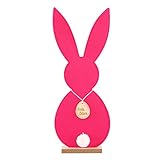 Mit einem Holzei Frohe Ostern verziert