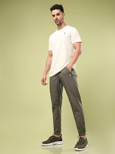 Image of TECHNOSPORT Men Mid Rise Regular Fit Solid Stretchable Joggers, Techno Dry for Regular Use and Sports
