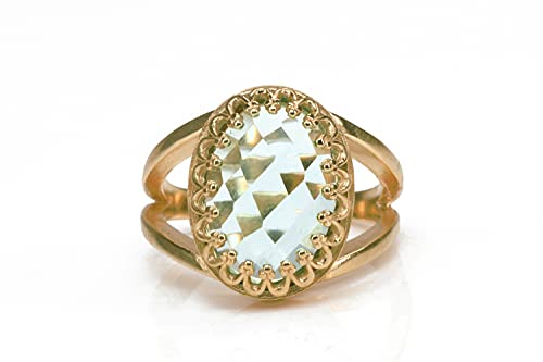 Bague de fiançailles en or rose et topaze bleue ovale artisanale