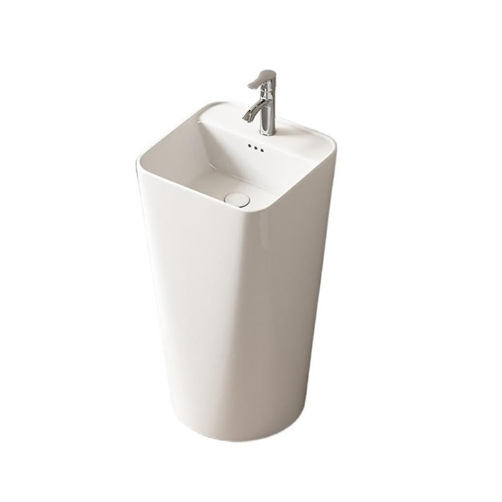 Biały porcelanowy zlew na cokole ze srebrnym kranem i zestawem odpływowym elegancki zestaw umywalkowy łazienkowy nowoczesny design do remontu domu