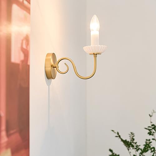 Apliques de pared de latón para dormitorio creando un ambiente cálido y sofisticado 3