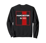 T-shirt avec slogan de supporter de football Manchester Is Red Avec une police propre, moderne et raffinée et délivrant un message humoristique et amusant - Manchester Is Red. Pour tout fan de football et supporter qui soutient le côté rouge de Manchester.