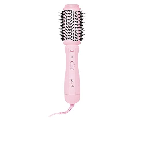 Brosse soufflante rose pour un brushing rapide à la maison