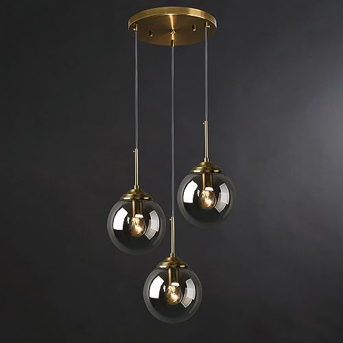 Lustre suspension globe en verre pour illuminer votre îlot de cuisine au style mid-century