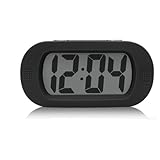 Pratique : L'après-midi, l'écran affiche PM, et le matin, il n'affiche pas AM. Le réveil est à 12 heures