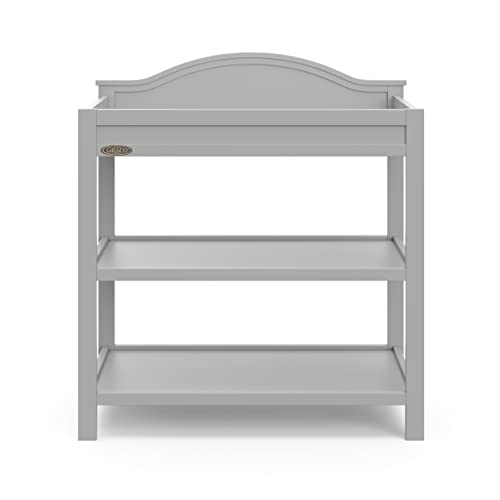 Image of Graco Story Changing Table with Water-Resistant Pad - GREENGUARD Gold Certified Baby Changing Station with Safety Strap, 2 Open Shelves, and a Nursery Must-Have Design (Pebble Gray)
