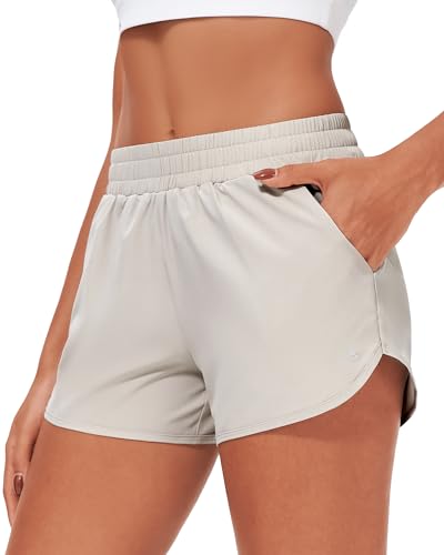Stelle Pantalones cortos de correr para mujer, de 7,6 cm, con forro de malla, cintura alta, pantalones cortos de entrenamiento de secado rápido, con bolsillos, Gris (Sandy Grey), XL