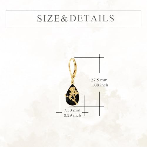 Close-up of beautiful 14K real gold earrings featuring shimmering black crystal