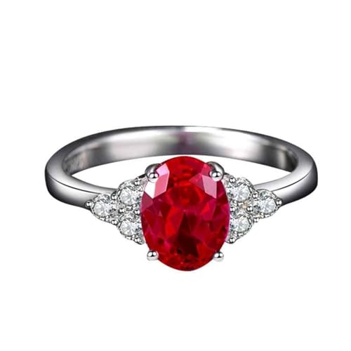 Bague de mariage or blanc et rubis ovale serti de moissanite d'exception