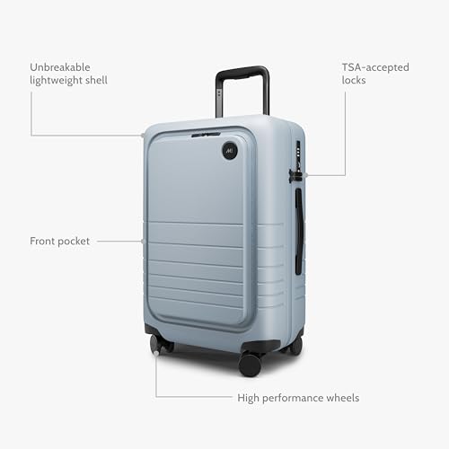 Image of Monos Carry-On Pro Plus Luggage 23 Inch - Hardside Spinner Suitcase with TSA Lock & Laptop Front Pocket | Airline Approved, 42L Polycarbonate Rolling Carry On | Fits 16 inch Laptop | Blue Haze