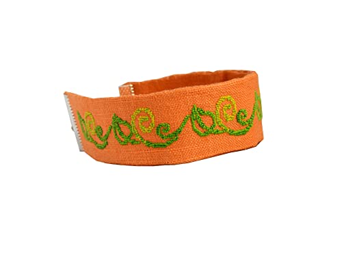 Handmade embroidered bracelet with green leaf