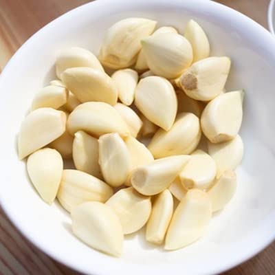 『How to Best Eat Raw Garlic Without Burning Your Mouth』のカバーアート