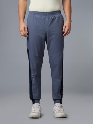 Image of TECHNOSPORT Men's Regular Fit Joggers with Zip Pockets, TECHNOLITE Quick Dry Stretchable Lightweight Track Pants for Gym Running and Casual Wear