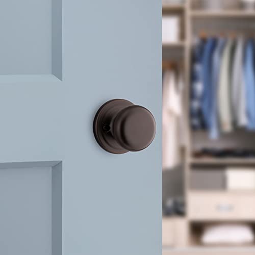 Image of Kwikset Hancock Dummy Door Knob, Single Sided Handle for Closets, French Double Doors, and Pantry, Venetian Bronze Non-Turning Interior Push /Pull Door Knob, with Microban Protection