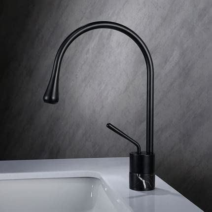 Mitigeur lavabo noir et laiton élégant pour salle de bain moderne