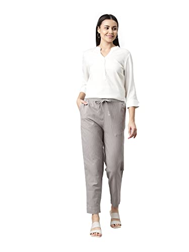 Image of GO COLORS Ikat Print Beige Printed Pencil Pant for Women | Breathable, Side Pocket