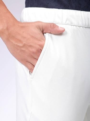 Image of The Indian Garage Co Men Slim Fit Solid Mid-Rise Stretchable Knitted Jogger Trousers