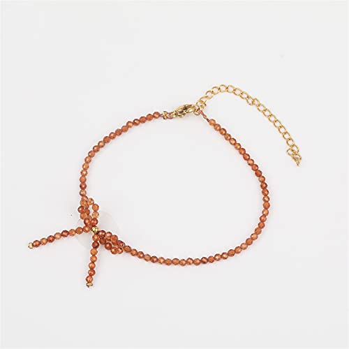 Bracelet en tourmaline naturelle et améthystes noué avec un élégant papillon en quartz