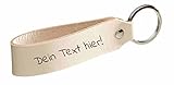 Dekorativer Schlüsselanhänger aus hellem, beigefarbenem Leder mit individueller Gravur