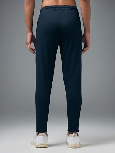 Image of TECHNOSPORT Men's Slim Fit Track Pants with Zip Pockets, ELASTO Plus Quick Dry Stretchable Lightweight Lower for Gym Running Yoga and Sports