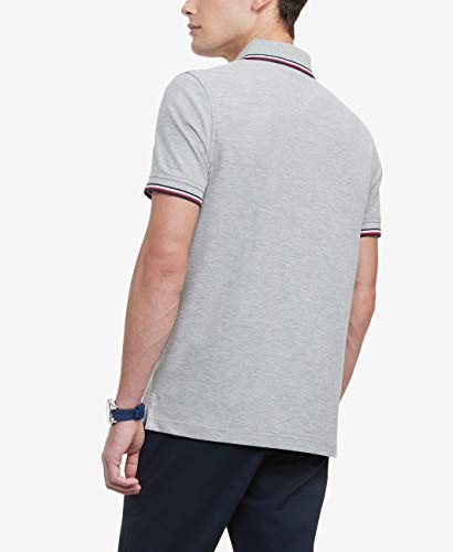 Image of Tommy Hilfiger Men's Short Sleeve Moisture Wicking Stretch Polo Shirt With Quick Dry + Uv Protection