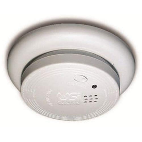 Back of Universal Security Instruments 1204 Smoke Alarm showing model number, manufacturing date, battery replacement instructions, and radioactive material warning.