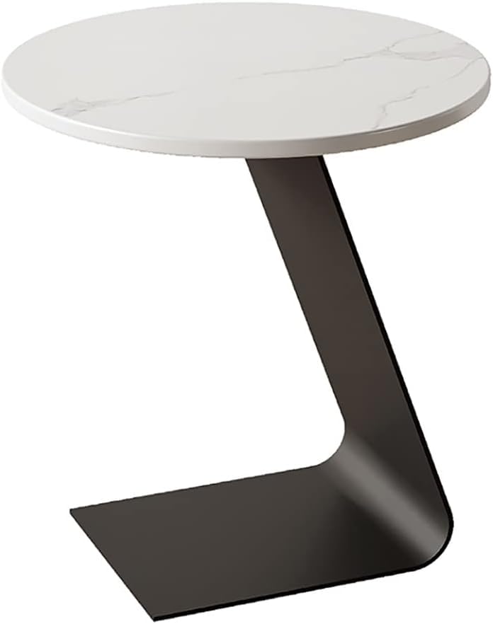 Petite table ronde pour salon, la solution pour optimiser l'espace près du canapé