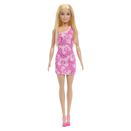 Image of Barbie Dolls in Barbiecore-Inspired Outfits with Pink & Purple Heels, Variety of Pink Patterned Dresses and Hair Colors