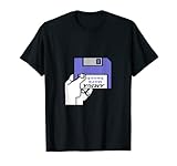 Commodore Amiga verwendet, um eine Diskette auf einer A500 zu starten. Die Scheibe wird von einer Hand gehalten, um anzuzeigen, dass er in die Amiga eingefügt werden soll.
