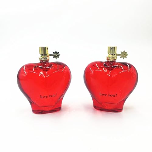 Perfume de mujer en frasco en forma de corazón rojo, con...