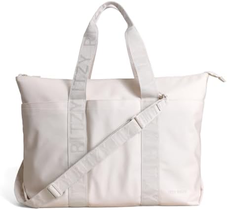 Itzy Ritzy Diaper Bag Tote – Lightweight Belong All-in-Tote Weekender Bag with 10 Pockets, Removable & Adjustable Crossbody Strap, Stroller Straps & Trolley Sleeve – For Daily Use or Travel (Cream)