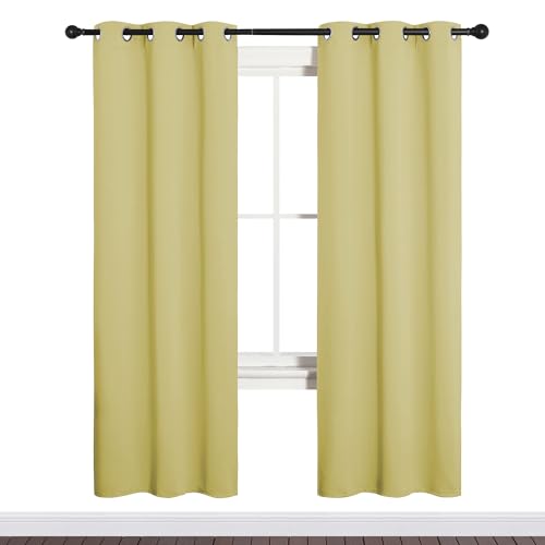 Image of NICETOWN Bedroom Curtain Panels Blackout Draperies, Thermal Insulated Solid Grommet Blackout Curtains /Drapes (Paler Yellow, 1 Pair, 34 by 72-inch)