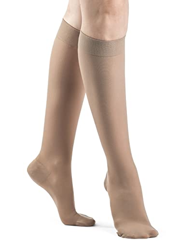 Image of DYNAVEN by Sigvaris Women's Compression Calf-High Socks 20-30mmHg Weight - Closed Toe Design for Everyday Support - Small Long - Light Beige
