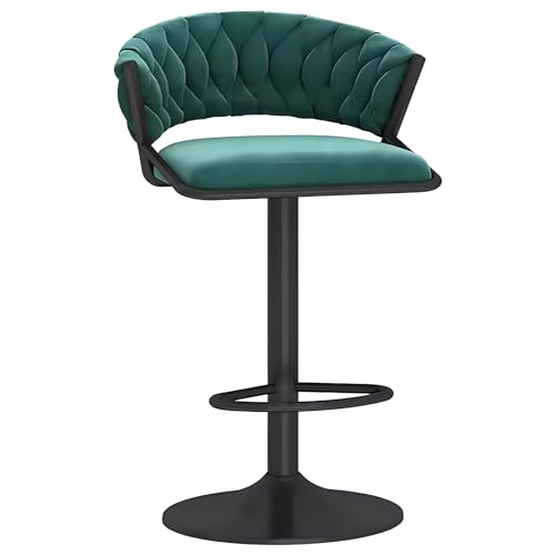 Tabouret de bar en velours vert autour de l'îlot central de cuisine