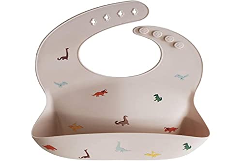 Image of mushie Silicone Baby Bib | Adjustable Fit Waterproof Bibs (Dinosaurs)