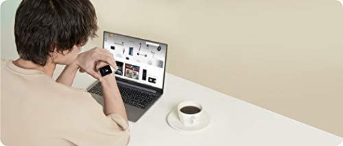 Person wearing Xiaomi Mi Smart Watch Lite and earbuds, controlling music.