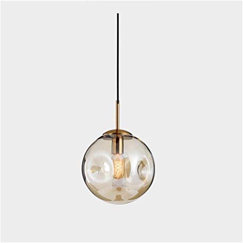 Chandelier boule de verre pour sublimer un salon sombre sans éblouir