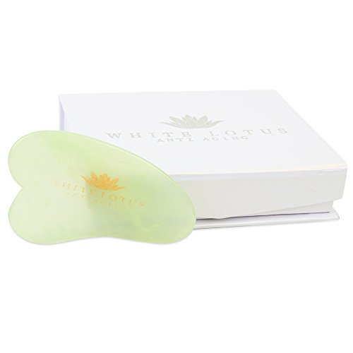 Pure Jade Gua Sha Anti-Aging massage tool, Packaged in a Traditional Silk Lined Box, Individually Hand Carved Gua Sha Scraping Board by White Lotus Anti Aging. The Ultimate Anti Aging Massage