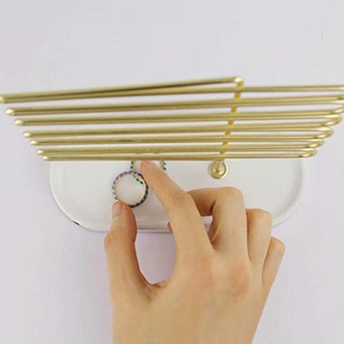 Range-bijoux doré compact pour ne plus jamais perdre vos petites puces