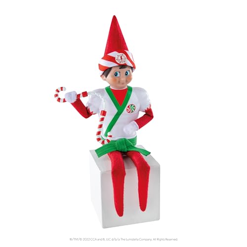 The Elf on the Shelf Karate Kicks Clothes Set - Help Your Scout Elf Serve up Polar Punches - Accessories Include Jolly Bandana, Plastic Muscle Chest Piece with Belt and Peppermint Nunchucks - Image 3