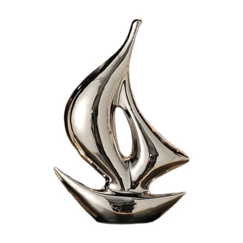 Figurine de bateau à voile argenté pour revitaliser un meuble de salon vide