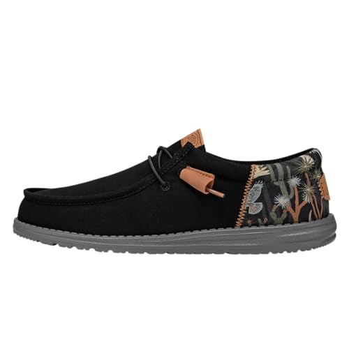Image of HEYDUDE Men's Wally Funk Oasis Slip On Loafer, Black Size 6 | Jungle Print, Lightweight Textile Upper, Easy On Laces & Foam Insole