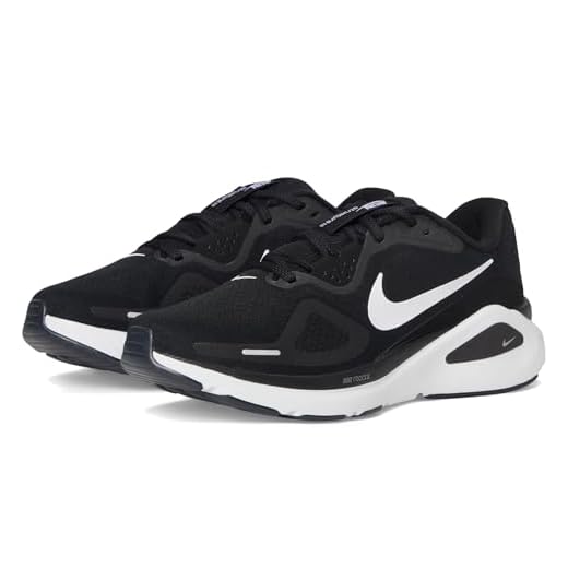 NIKE Femme Structure 26 Sneaker, Black White Cool Grey Metallic, 38.5 EU