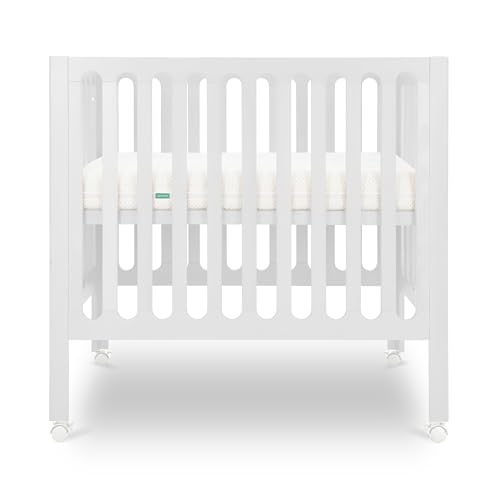 Newton Baby Mini Crib Solid Beech Wood with Wheels in White Color, Adjustable Mattress Height, Ultra-Safe Non-Toxic Finish, Mini Crib Mattress Included