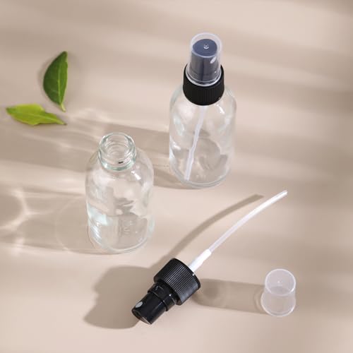 Image of NOOEEISS Green Glass Small Spray Bottles 2 oz 48Packs,Fine Mist Sprayer Pretty Finish,Refillable Containers mini spray bottles for Cleaning Solutions and Skin Care (Green Frosted 48pcs)