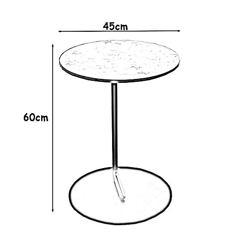 Table basse ronde en marbre stable et compacte pour optimiser les petits salons