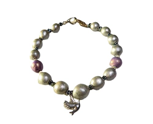 Bracelet breloque oiseau en argent et pourpre, elegance et finesse de la maille
